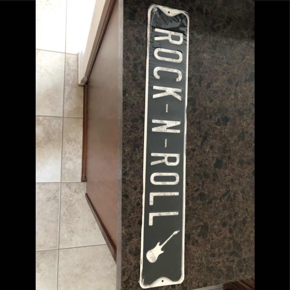 Rock and roll metal sign
